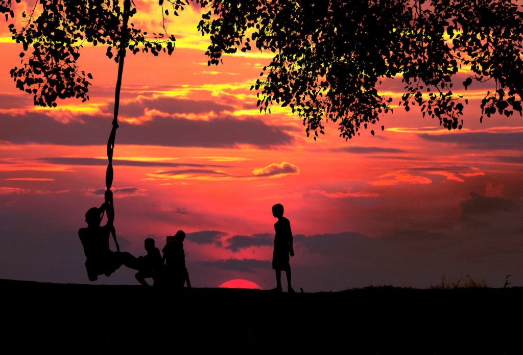 Silhouette Photo of Children Playing