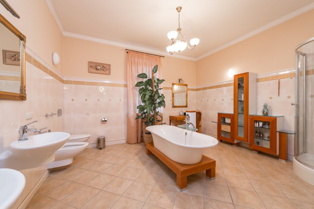 Luxury spacious bathroom in traditional style