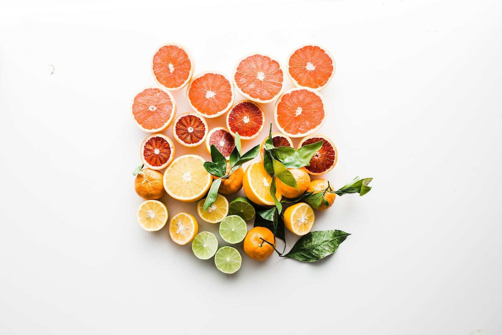 sliced fruit on white surface