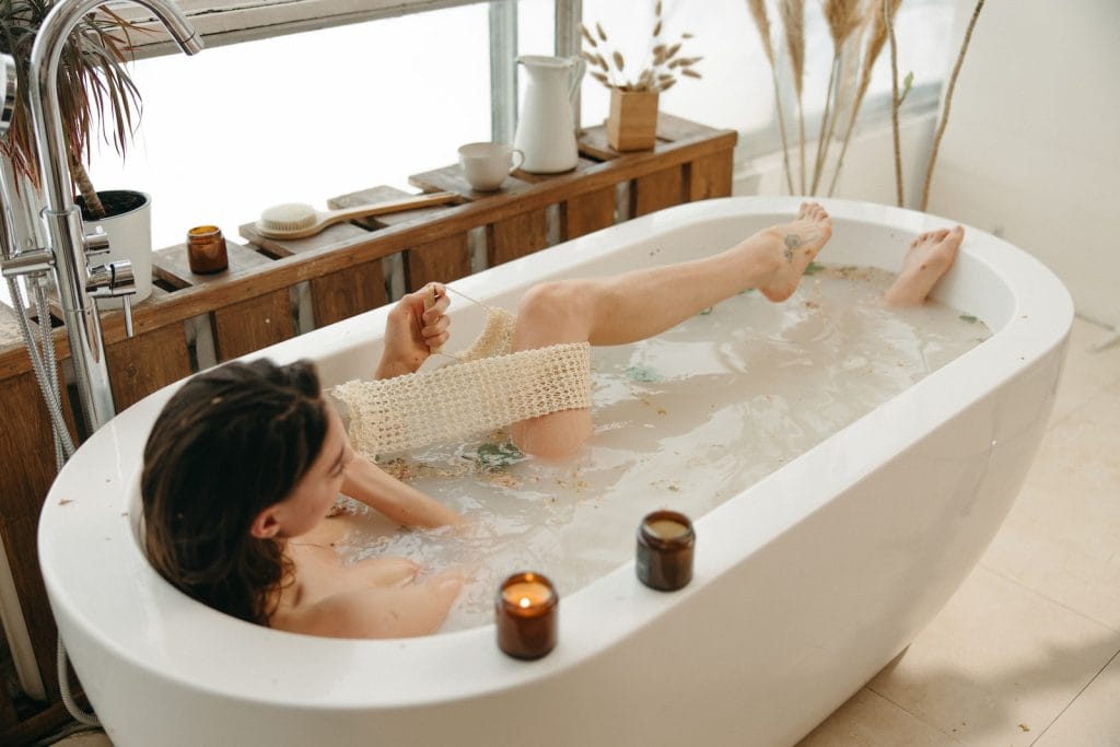 A Woman in Bathtub With Water