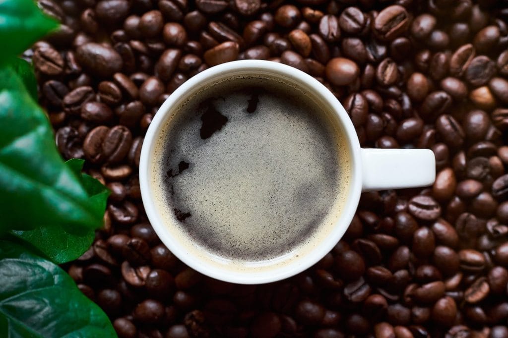 white ceramic mug with coffee