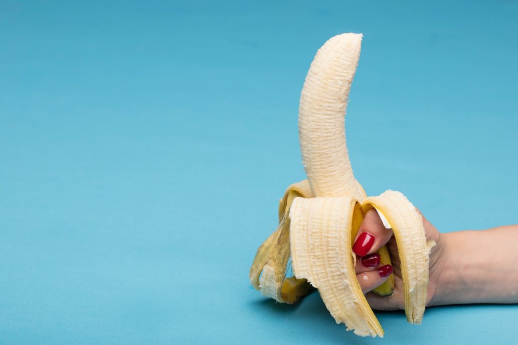 sliced banana fruit on blue surface