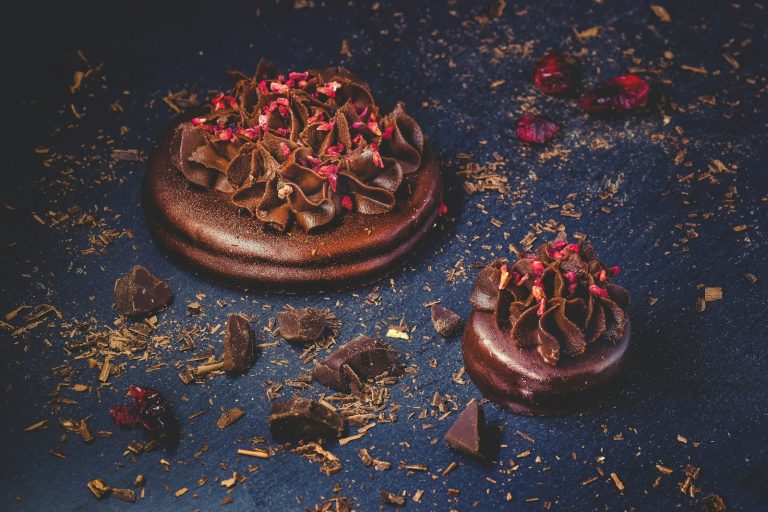 chocolate cookie on blue surface